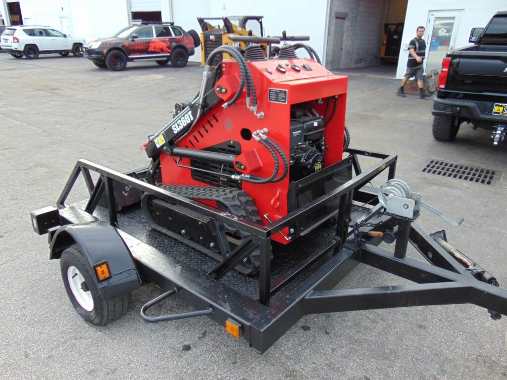 mini excavator on a trailer